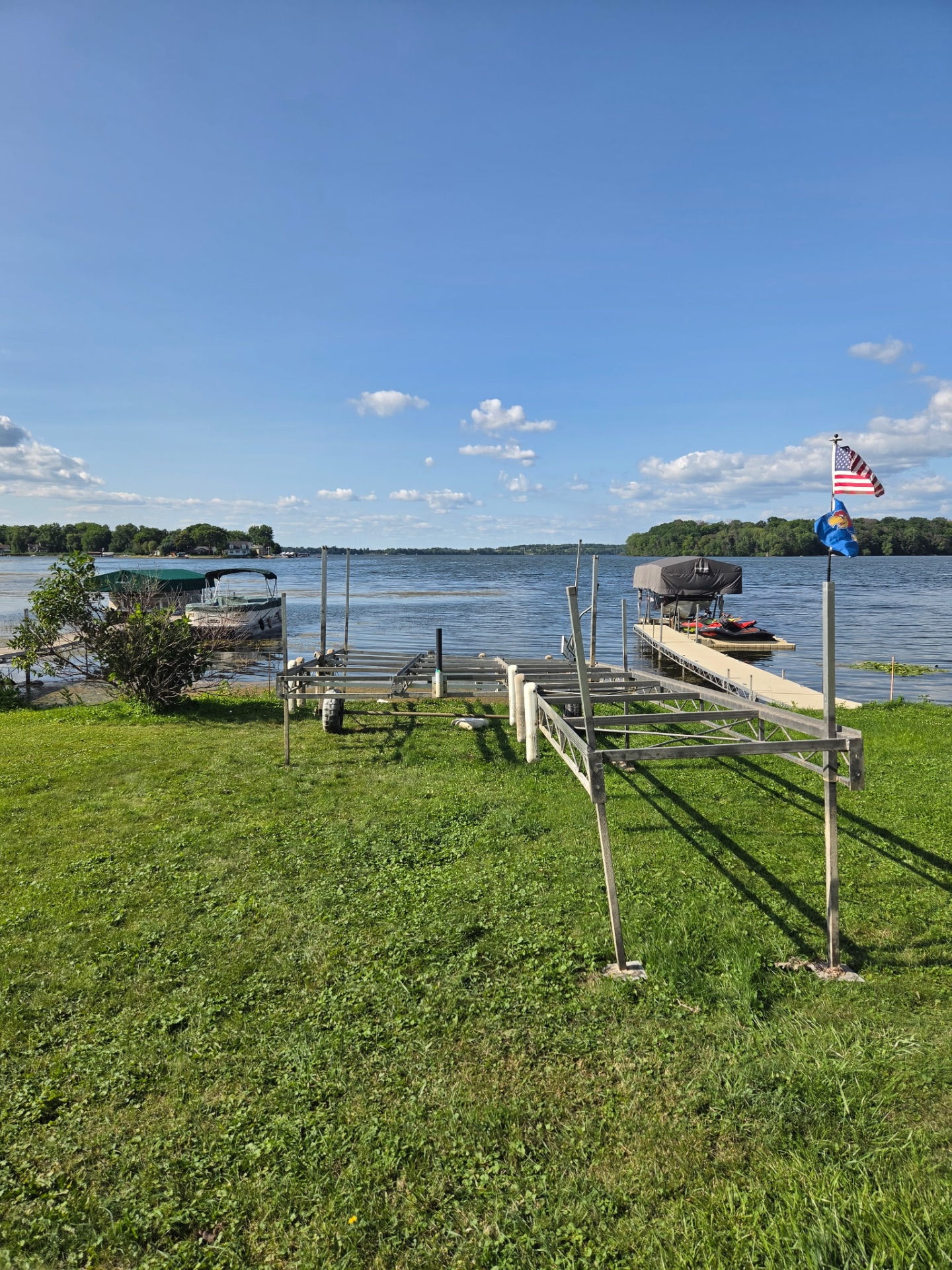 Repaired boat lift standing level on the shoreline after welding